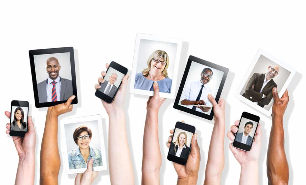 Hands Holding Digital Devices with Business People