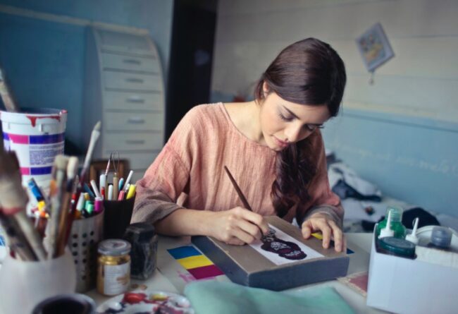 Designer drawing at desk