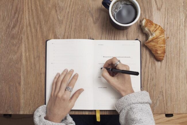 Journal and coffee